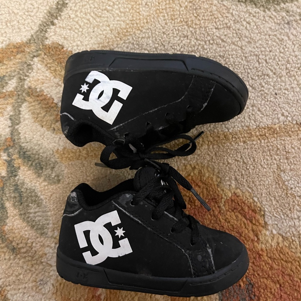 Black and white DC sneakers